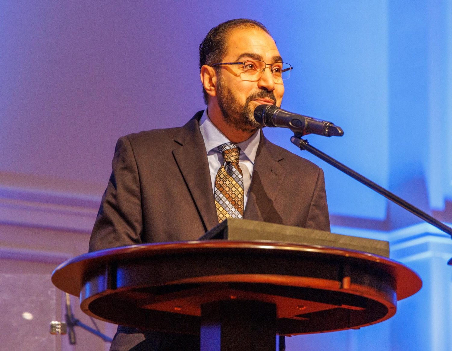 Pastor Mokhles Hanna of the Light of the World Arabic Church exhorts his congregation to worship the virgin born Christ.