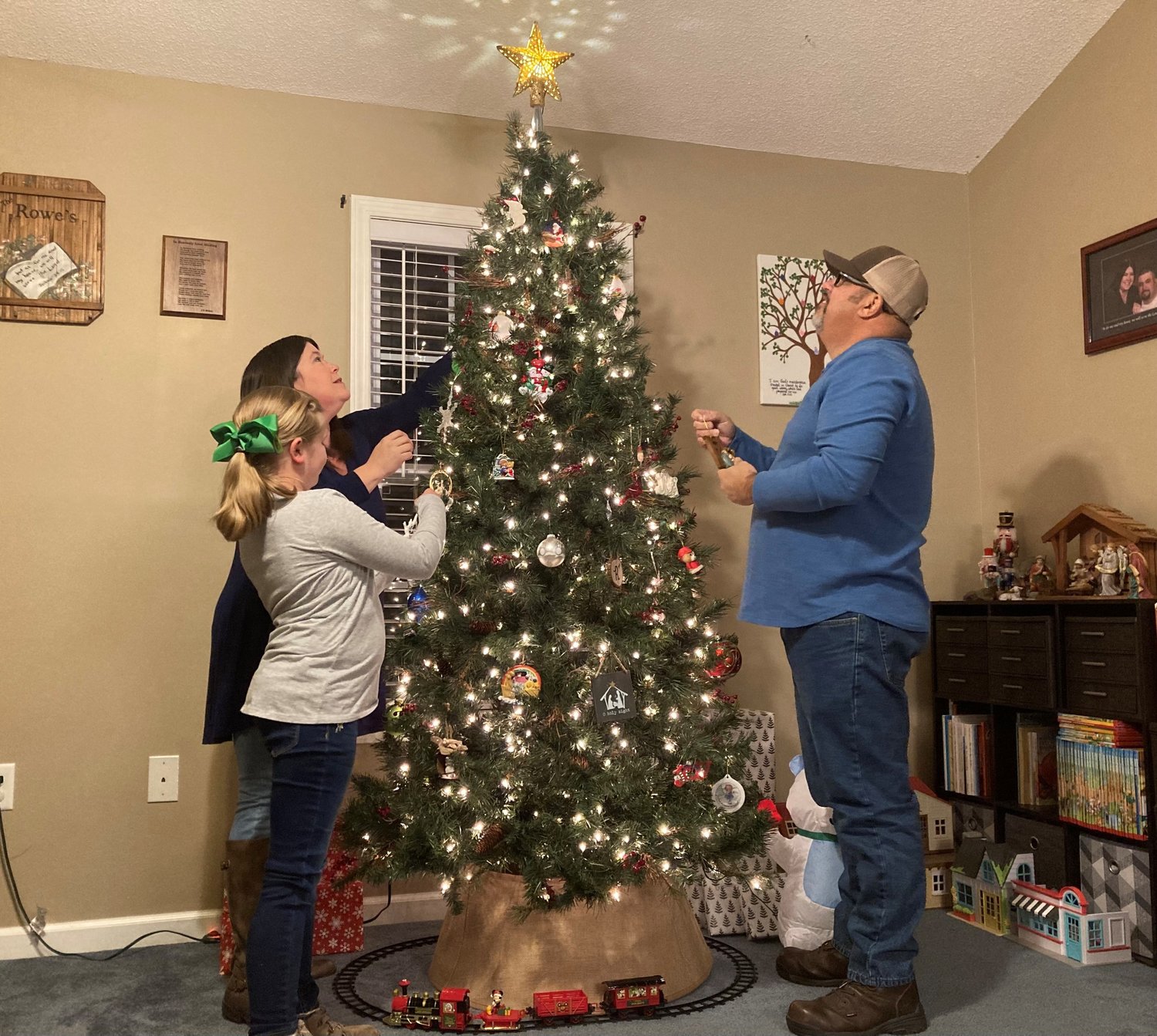 The Rowe family of southeast Georgia enjoy the Christmas season after receiving a life-saving gift. (Index/Roger Alford)