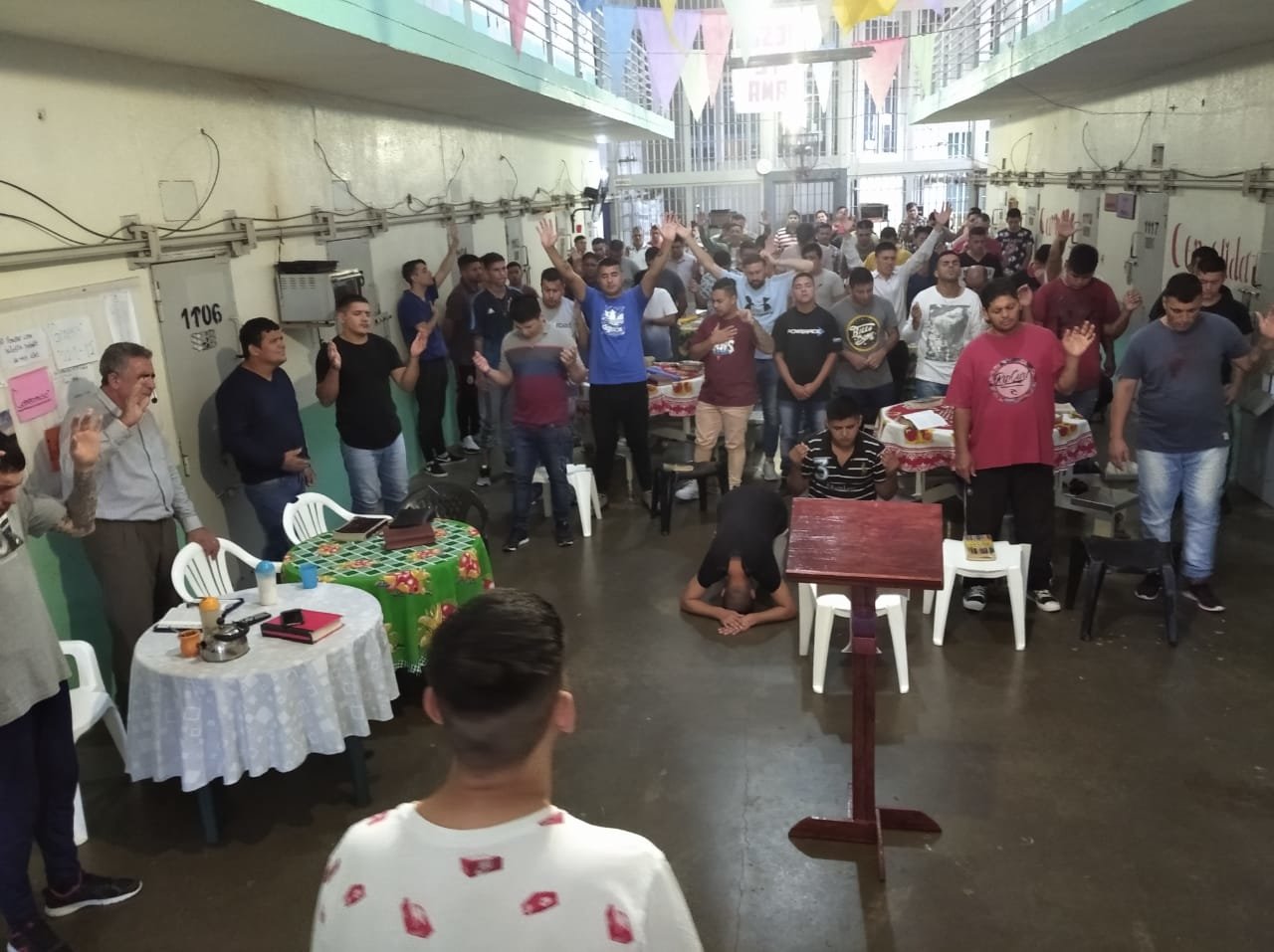 Inmates worship inside a prison in Argentina, where revival is underway.