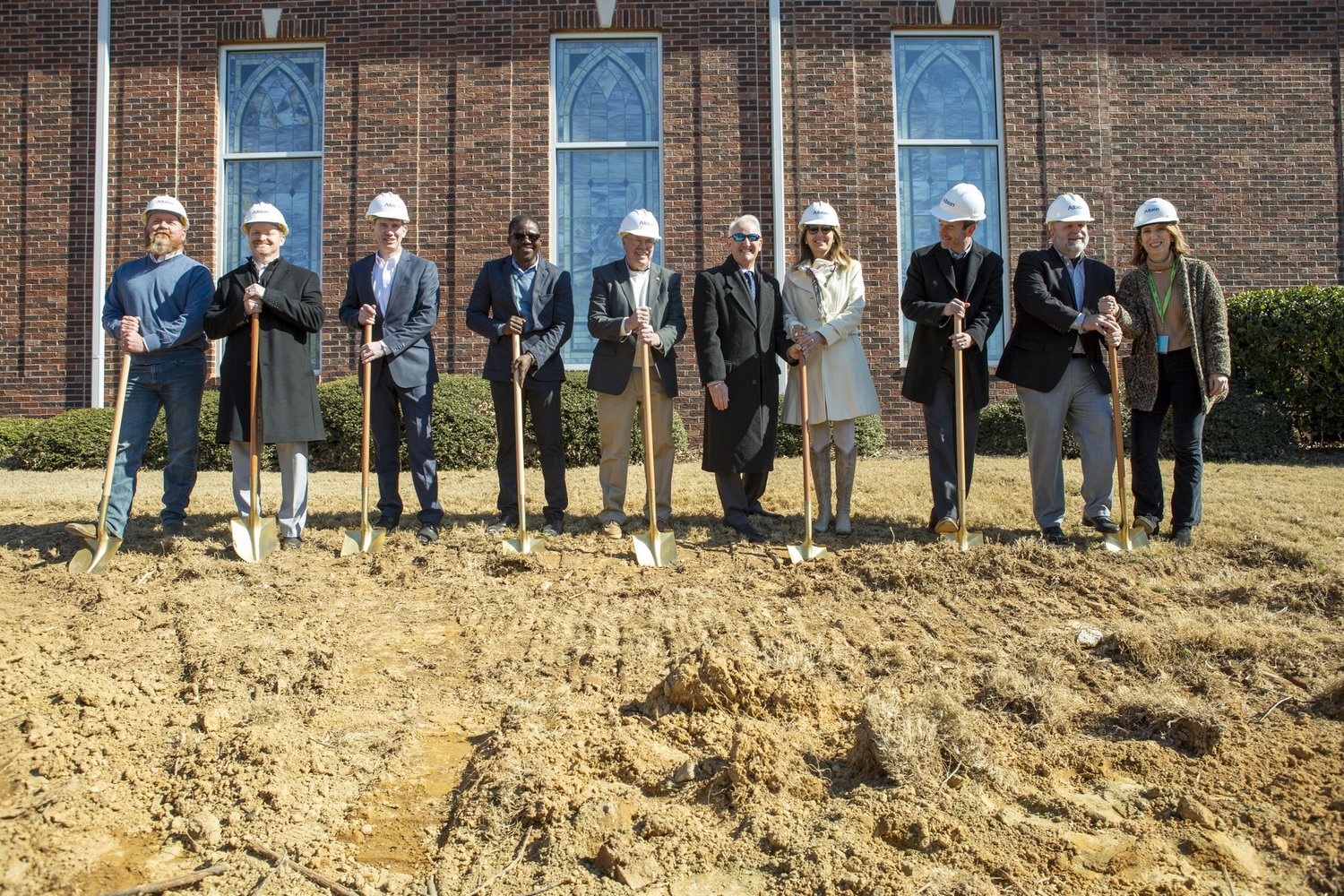 Some of the leaders at Ivy Creek Baptist Church pose for a photo at a ceremonial groundbreaking on Sunday.