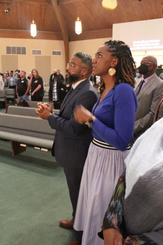 Pastor James Oney and his wife Chantel are on the first row on his first Sunday as pastor of Liberty Baptist Church in Fayetteville.