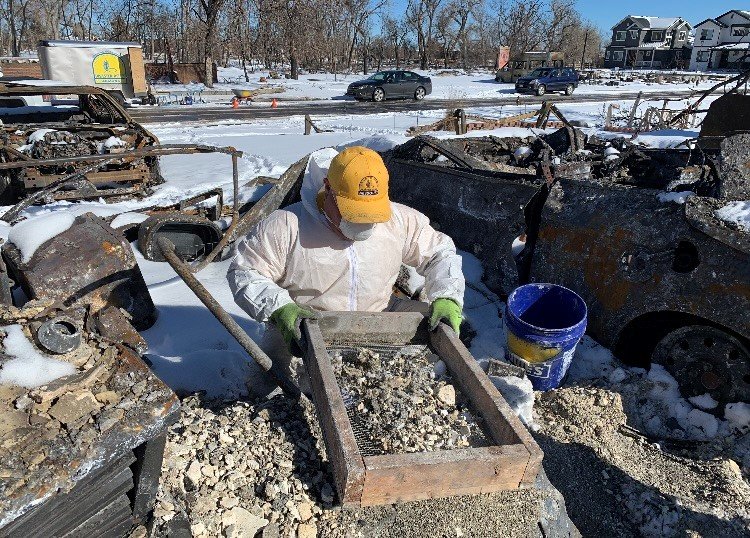 A Baptist Disaster Relief volunteer sifts through ashes of a Colorado home trying to find rings and other valuables. (Photo/Colorado Baptist Disaster Relief)