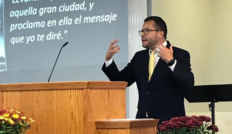 Luís R. Lopez, shown here preaching, to fill post vacated by Julio Ariola.