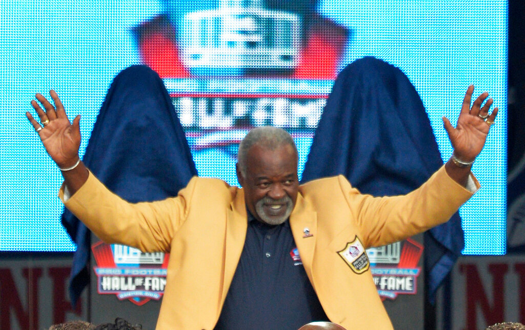 Enshrinee Rayfield Wright is introduced during the Pro Football Hall of Fame enshrinement ceremony Saturday, Aug. 2, 2014, in Canton, Ohio. (AP Photo/David Richard)