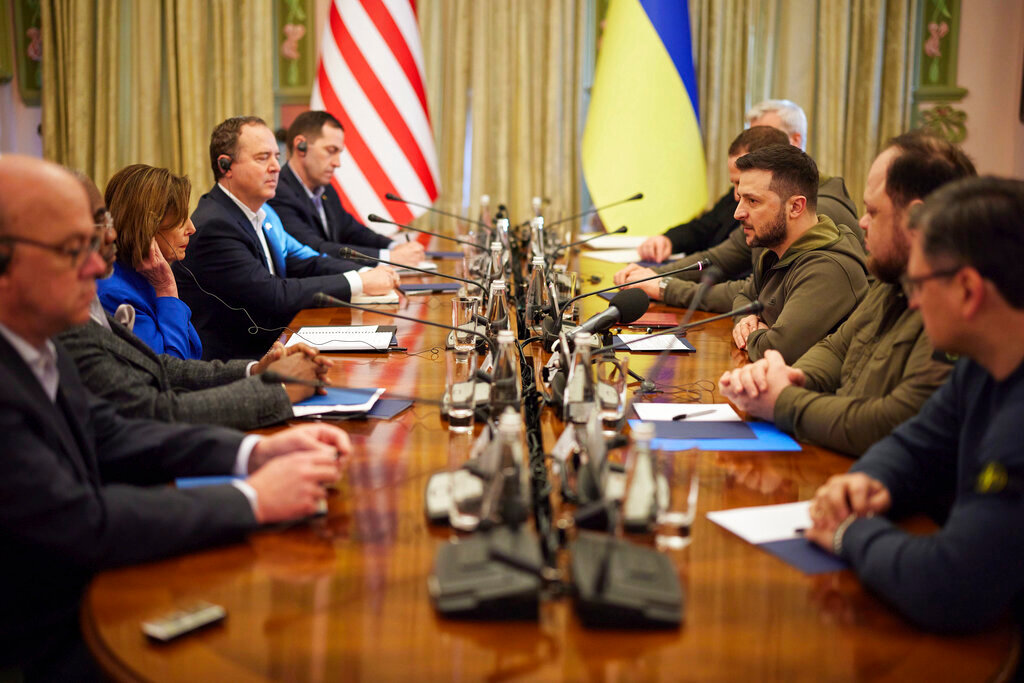 In this image released by the Ukrainian Presidential Press Office on Sunday, May 1, 2022, Ukrainian President Volodymyr Zelenskyy, third from right, and U.S. Speaker of the House Nancy Pelosi, third from left, talk during their meeting in Kyiv, Ukraine, Saturday, April 30, 2022. Pelosi, second in line to the presidency after the vice president, is the highest-ranking American leader to visit Ukraine since the start of the war, and her visit marks a major show of continuing support for the country's struggle against Russia.  (Ukrainian Presidential Press Office via AP)