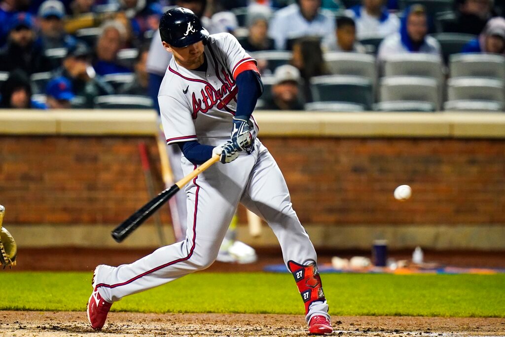 Atlanta Braves' Austin Riley hits a home run during the fourth inning of a baseball game against the New York Mets Monday, May 2, 2022, in New York. (AP Photo/Frank Franklin II)