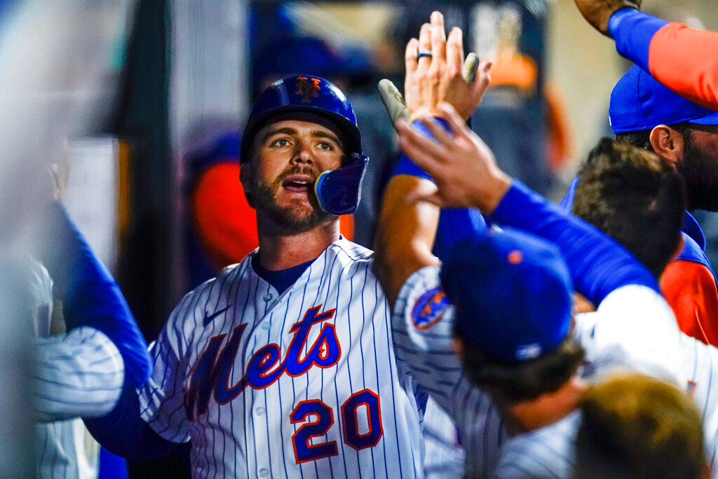 New York Mets' Pete Alonso celebrates with teammates after hitting a home run during the sixth inning in the second game of a doubleheader against the Atlanta Braves Tuesday, May 3, 2022, in New York. (AP Photo/Frank Franklin II)