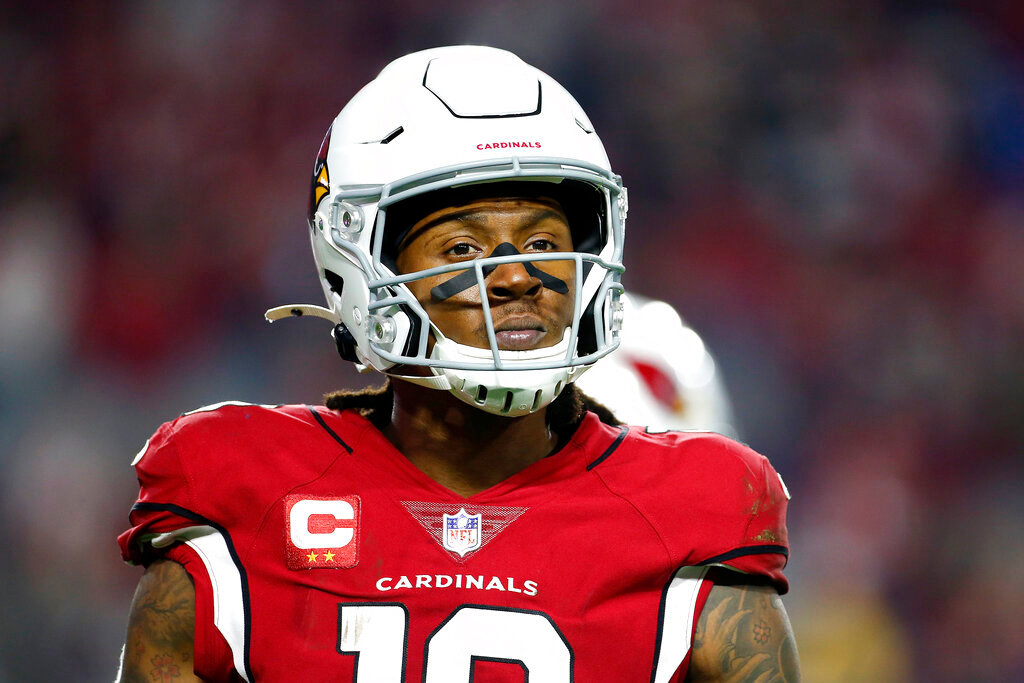 Arizona Cardinals wide receiver DeAndre Hopkins looks to the sideline during a timeout in second half of an NFL football game against the Los Angeles Rams, Dec. 13, 2021, in Glendale, Ariz. Cardinals three-time All-Pro receiver Hopkins has been suspended six games for violating the NFL’s policy on performance-enhancing substances. (AP Photo/Ralph Freso, File)