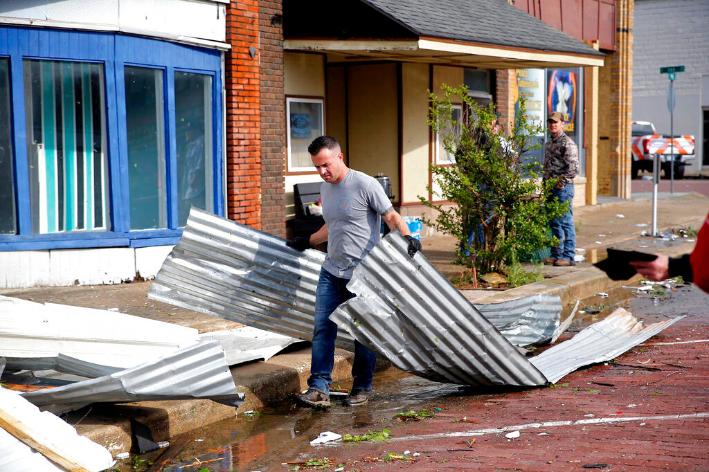 Tony Dowdy, of Victory Family Church, helps clean up tornado damage in Seminole, Okla., Thursday, May, 5, 2022. The area was hit by strong storms Wednesday evening. (Photo/Sarah Phipps, The Oklahoman via AP)