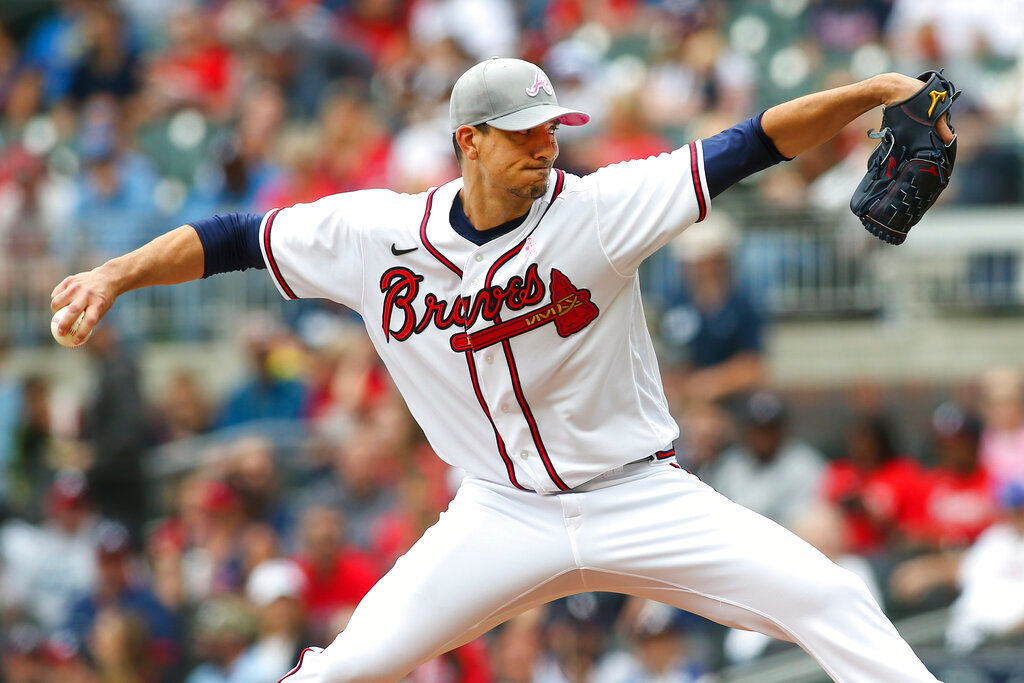 Atlanta Braves starting pitcher Charlie Morton throws in the first inning of a baseball game against the Milwaukee Brewers, Sunday, May 8, 2022, in Atlanta. (AP Photo/Brett Davis).