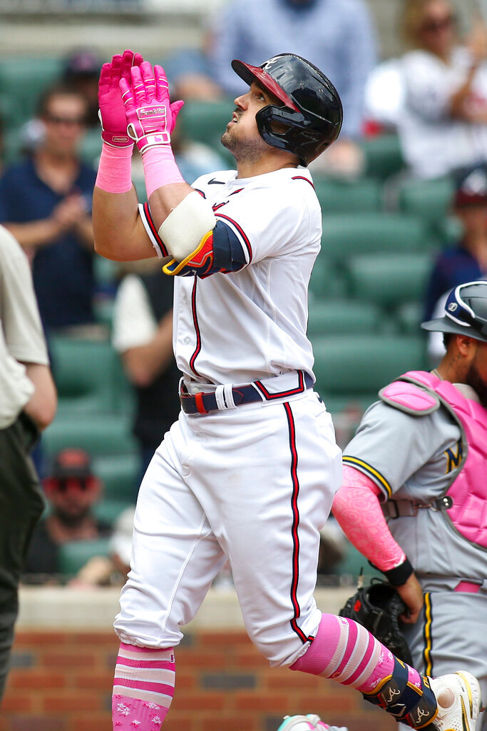Atlanta Braves left fielder Adam Duvall (14) celebrates after a home run in the third inning of a baseball game against the Milwaukee Brewers, Sunday, May 8, 2022, in Atlanta. (AP Photo/Brett Davis)