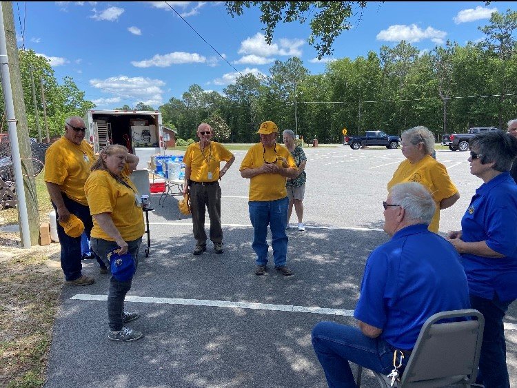 Georgia Baptist Disaster Relief volunteers gather in Douglas, Ga., a year after a tornado hit the community.