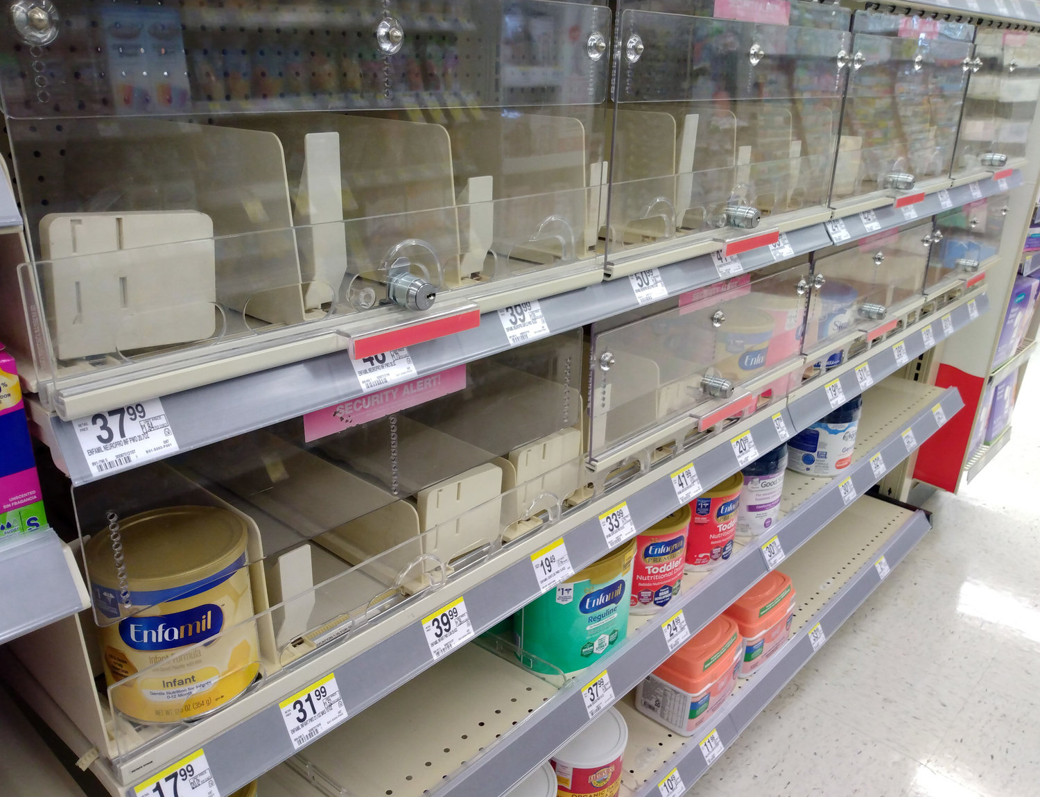 Locked shelves in the formula section of a Walgreen's Pharmacy sit mostly empty in Dallas, Ga., Monday, May 9, 2022. Parents across the U.S. are scrambling to find baby formula because of supply disruptions and a massive safety recall by manufacturer Abbott. (Photo/Henry Durand. The Christian Index)