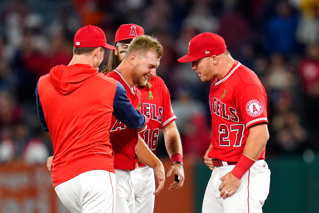 Los Angeles Angels starting pitcher Reid Detmers (48) celebrates with Mike Trout (27) after throwing a no-hitter against the Tampa Bay Rays in Anaheim, Calif., Tuesday, May 10, 2022. The Angels won 12-0. (AP Photo/Ashley Landis)