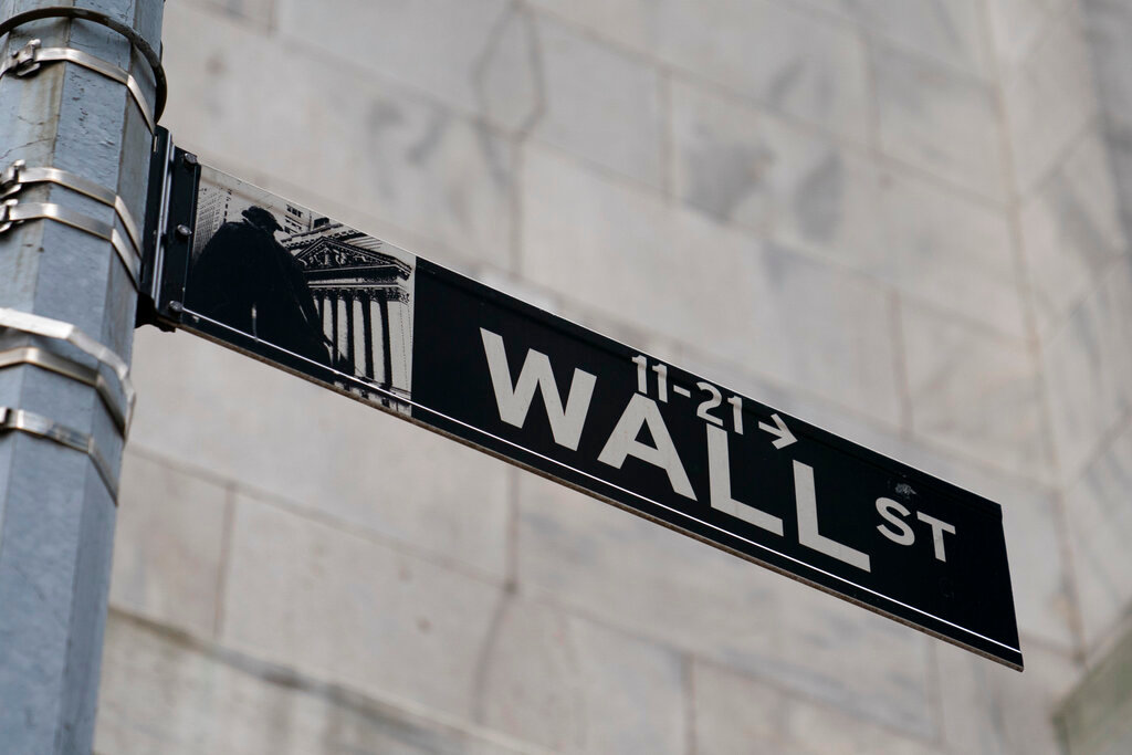 A Wall Street sign is shown in the Financial District, Wednesday, Oct. 13, 2021, in the Manhattan borough of New York. (AP Photo/John Minchillo, File)