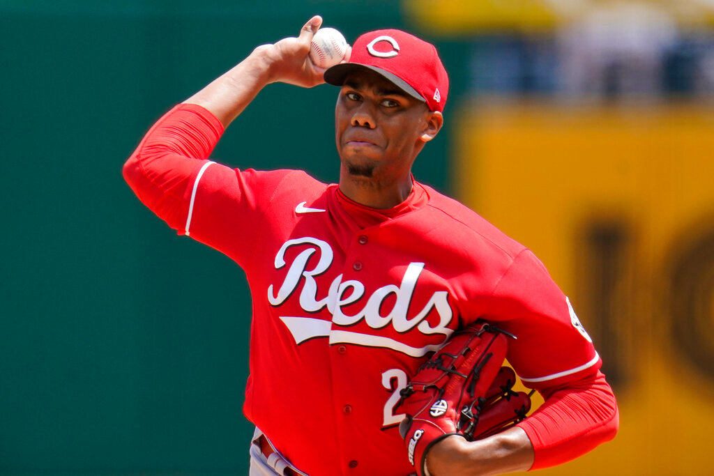 Cincinnati Reds starting pitcher Hunter Greene delivers during the first inning against the Pittsburgh Pirates in Pittsburgh, Sunday, May 15, 2022. (AP Photo/Gene J. Puskar)