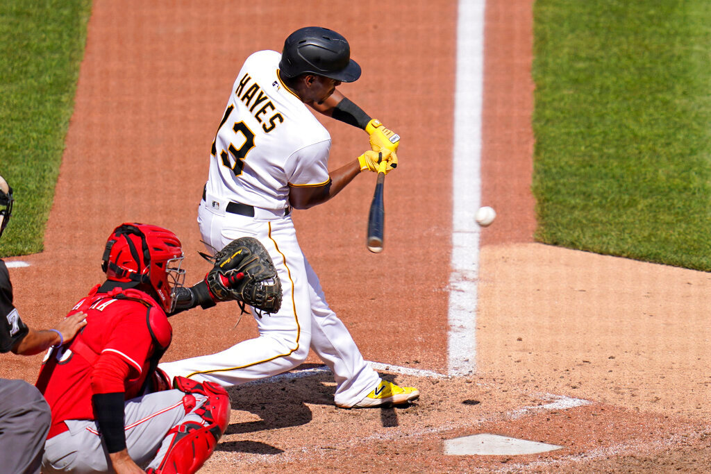 Pittsburgh Pirates' Ke'Bryan Hayes (13) hits into a fielder's choice off, driving in the game's only run, during the eighth inning in Pittsburgh, Sunday, May 15, 2022. (AP Photo/Gene J. Puskar)