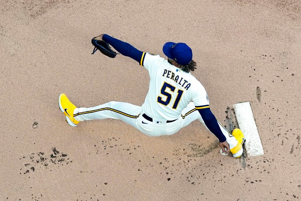 Milwaukee Brewers starting pitcher Freddy Peralta throws during the first inning against the Atlanta Braves, Monday, May 16, 2022, in Milwaukee. (AP Photo/Morry Gash)