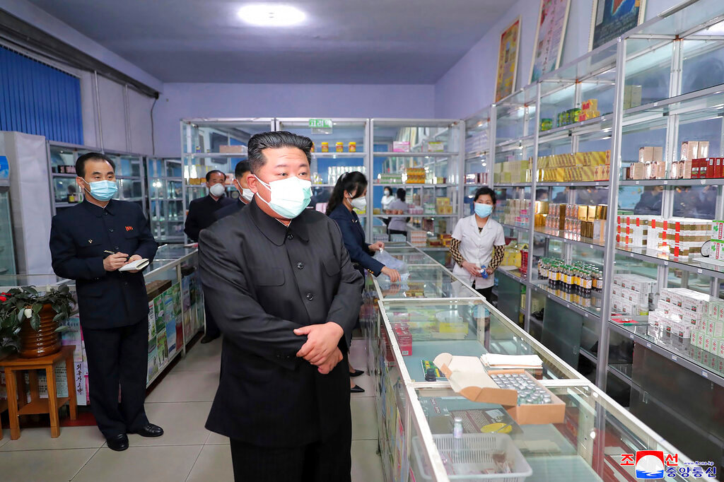 North Korean leader Kim Jong Un, center, visits a pharmacy in Pyongyang, North Korea on May 15, 2022. (Korean Central News Agency/Korea News Service via AP, File)
