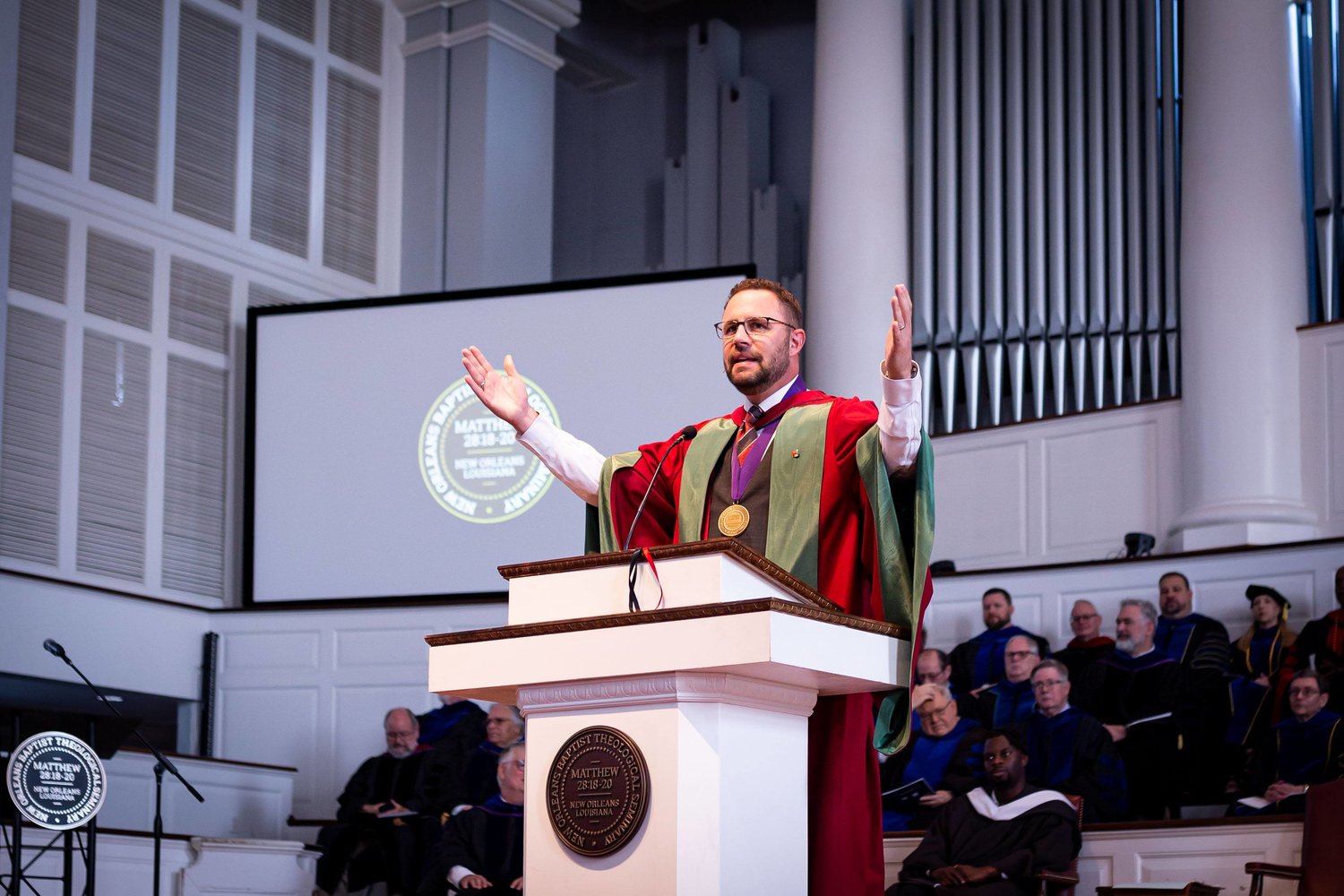 Jamie Dew, president of New Orleans Baptist Theological Seminary and Leavell College, addresses graduates in New Orleans at the school's May 2022 commencement. (Photo/Madelynn Duke)