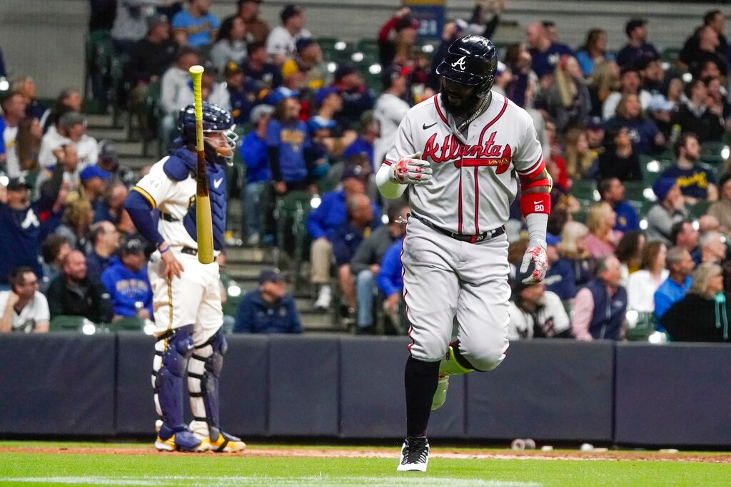Atlanta Braves' Marcell Ozuna starts to round the bases after hitting a two-run home run during the eighth inning against the Milwaukee Brewers, Tuesday, May 17, 2022, in Milwaukee. (AP Photo/Morry Gash)