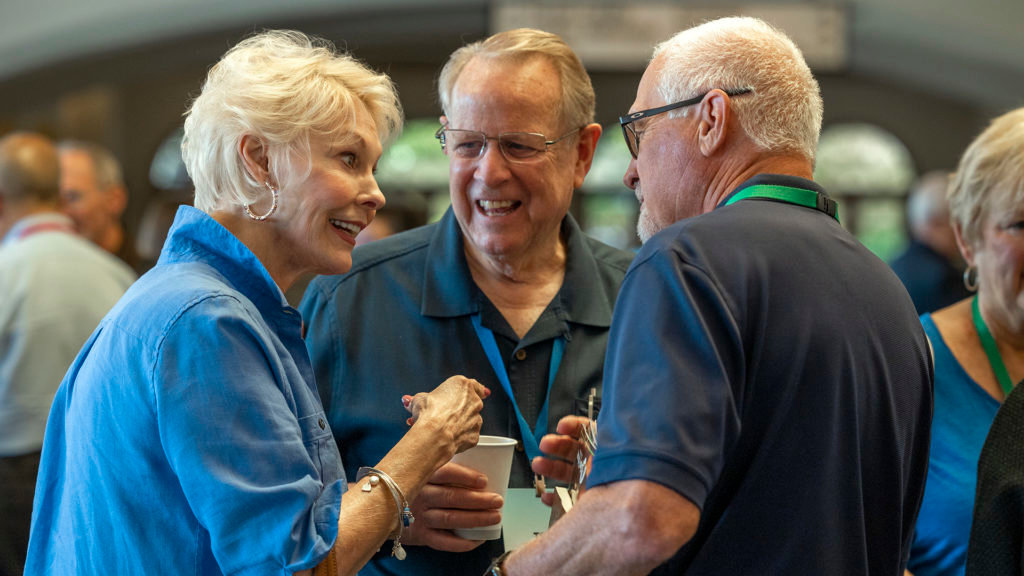 Former IMB President Tom Elliff, center, and his wife, Diana, greet trustees at the May 19 meeting in Orlando, Fla. (IMB Photo)