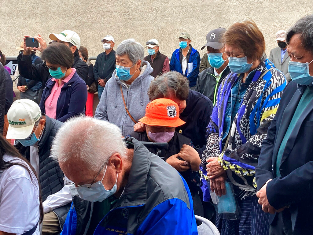 Survivors and church leaders joined in prayer nearly a week after a deadly shooting at a Taiwanese American church congregation in Laguna Woods, Calif., and thanked community members for their support. (AP Photo/Amy Taxin)