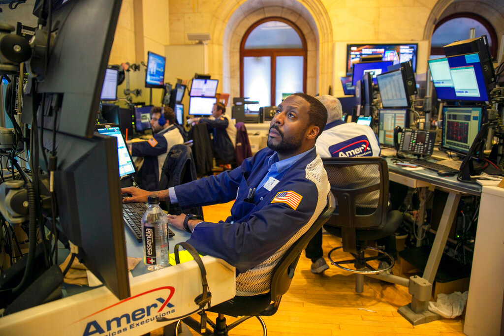 Traders work on the New York Stock Exchange floor in New York City on Friday, May 20, 2022. (AP Photo/Ted Shaffrey)