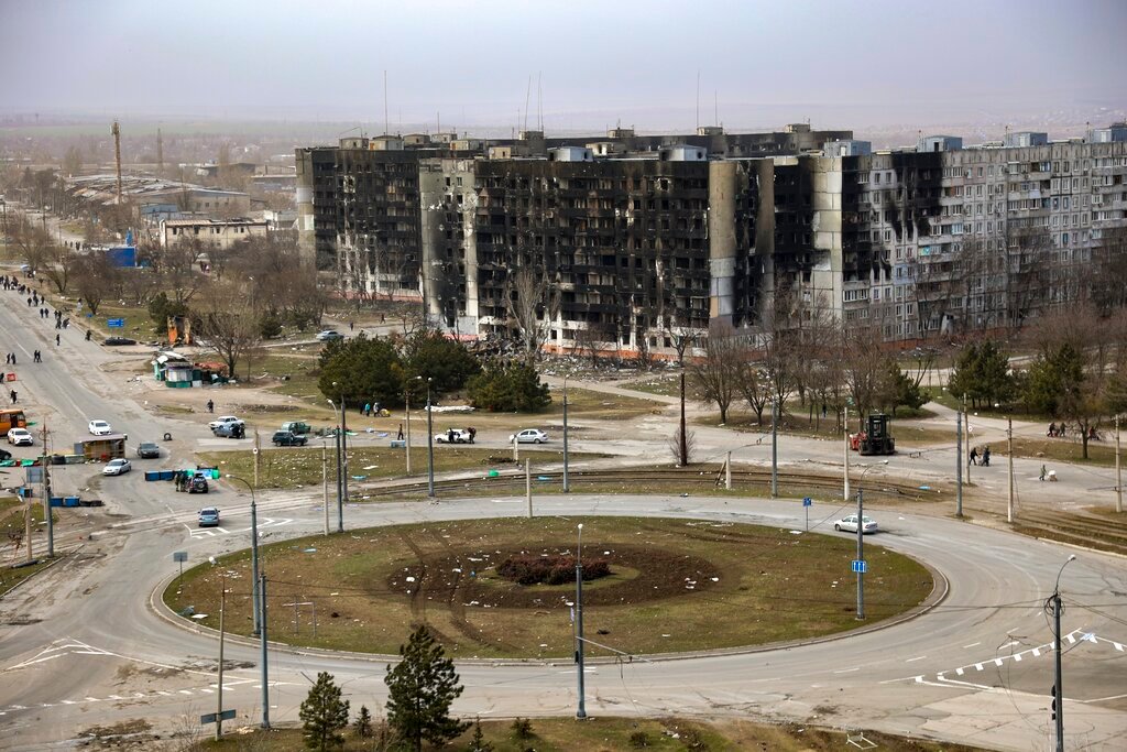 Damaged apartment buildings are seen after shelling from fighting on the outskirts of Mariupol, Ukraine, in territory under control of the separatist government of the Donetsk People's Republic, March 29, 2022. (AP Photo/Alexei Alexandrov, File)
