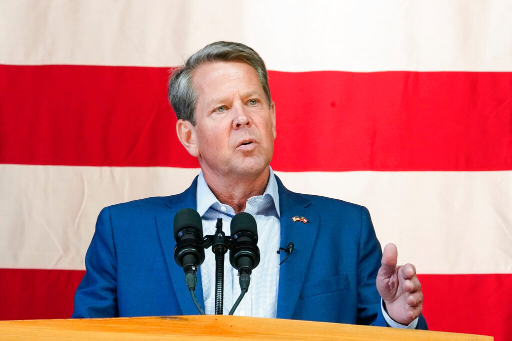 Georgia Gov. Brian Kemp speaks during a Get Out the Vote Rally, on May 23, 2022, in Kennesaw, Ga. After incumbent Kemp refused to accept former President Donald Trump's baseless claims of widespread voter fraud in Georgia, he sought retribution by personally recruiting former Republican Sen. David Perdue to mount a primary challenge. (AP Photo/Brynn Anderson, File)