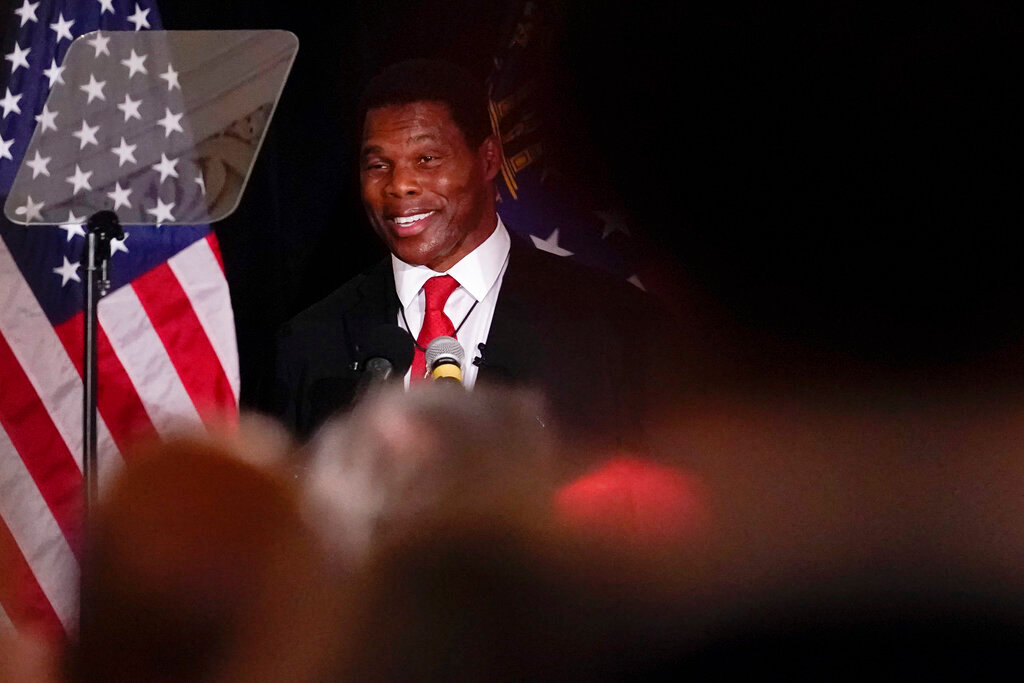 U.S. Senate candidate Herschel Walker speaks to supporters during an election night watch party, Tuesday, May 24, 2022, in Atlanta. Walker won the Republican nomination for U.S. Senate in Georgia’s primary election. (AP Photo/Brynn Anderson)