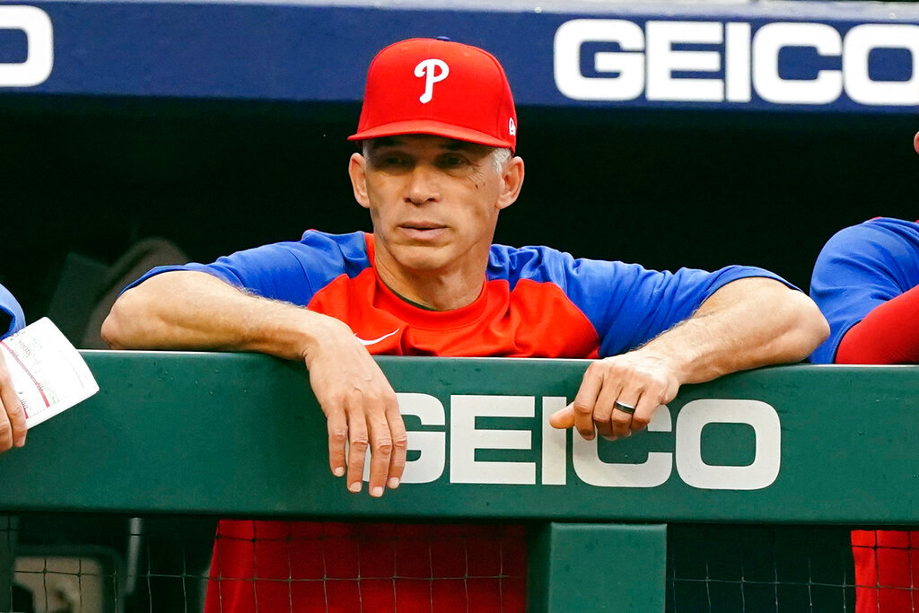 Philadelphia Phillies manager Joe Girardi watches from the dugout during the first inning against the Atlanta Braves on Wednesday, May 25, 2022, in Atlanta. (AP Photo/John Bazemore)