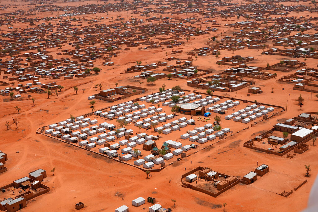 An aerial view shows a camp of internally displaced people in Djibo, Burkina Faso, Thursday May 26, 2022. (AP Photo/Sam Mednick)