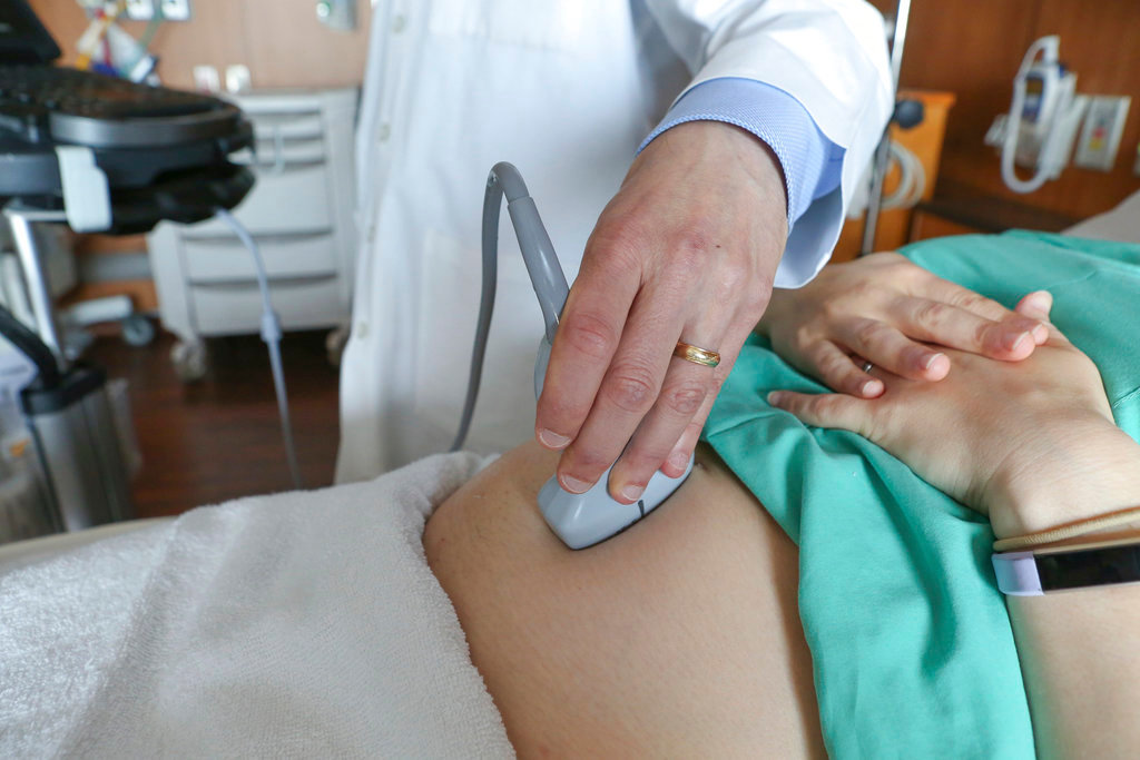 A doctor performs an ultrasound scan on a pregnant woman Aug. 7, 2018. (AP Photo/Teresa Crawford, File)