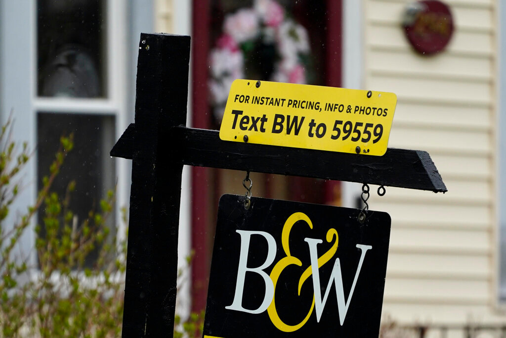 A sign is displayed outside a home in Wheeling, Ill., Thursday, May 5, 2022. (AP Photo/Nam Y. Huh)