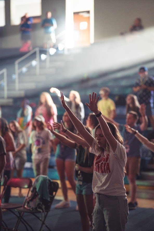 Students gathered for worship and praise music as part of the camp.