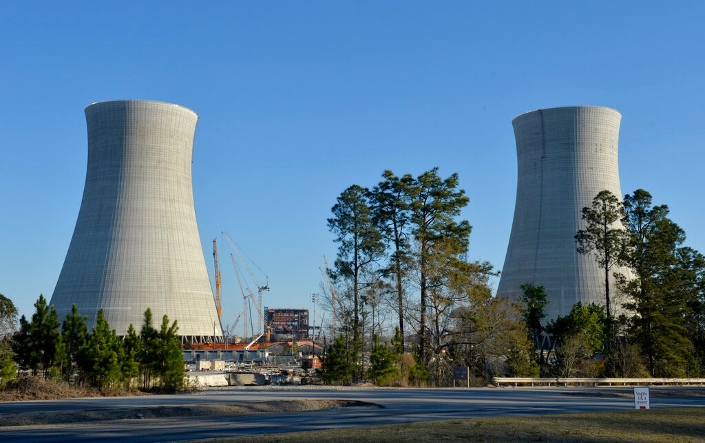 The cooling towers of the still under construction Plant Vogtle nuclear energy facility in Waynesboro, Ga., Friday, March 22, 2019. (Michael Holahan/The Augusta Chronicle via AP)
