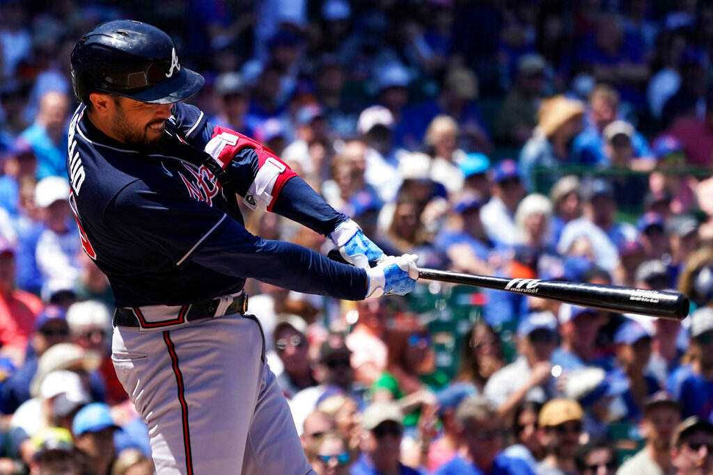 Atlanta Braves' Travis d'Arnaud hits a three-run home run during the first inning against the Chicago Cubs in Chicago, Sunday, June 19, 2022. (AP Photo/Nam Y. Huh)