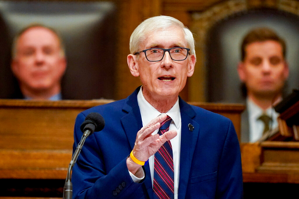 Wisconsin Gov. Tony Evers addresses a joint session of the Legislature in the Assembly chambers at the state Capitol in Madison, Wis. on Feb. 15, 2022. (AP Photo/Andy Manis, File)