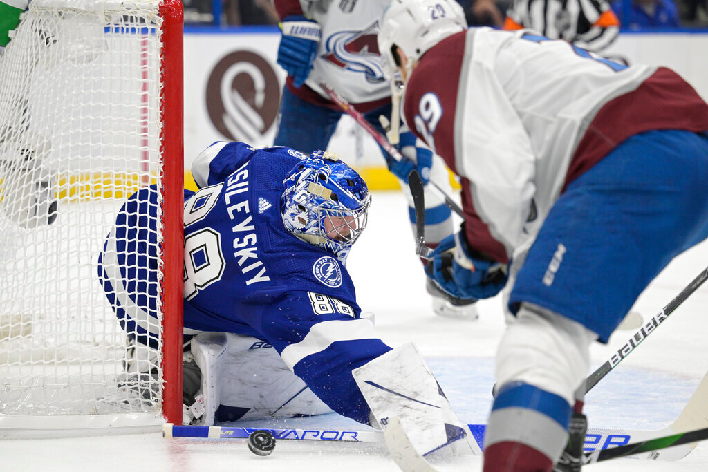 Tampa Bay Lightning goaltender Andrei Vasilevskiy blocks a shot during the second period of Game 4 of the NHL Stanley Cup Finals against the Colorado Avalanche on Wednesday, June 22, 2022, in Tampa, Fla. (AP Photo/Phelan Ebenhack)