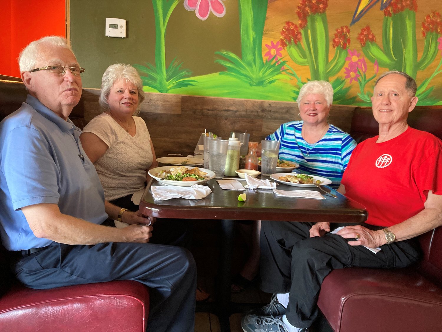 Some 25 retired IMB missionaries to Uruguay, including Dave and Diana Daniels, left, and Joe and Jeanie Benfield, gathered in Athens for a reunion. (Christian Index/Roger Alford)