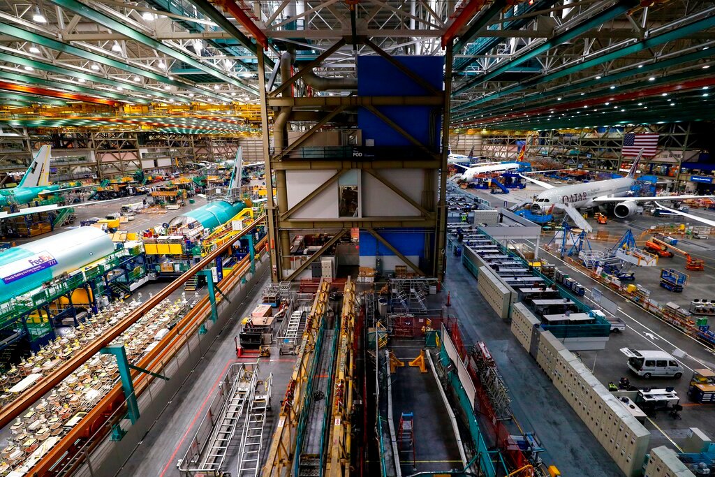 The 777 factory line, left, is seen next to the 787 line, right, at Boeing's Everett Production Facility Wednesday, June 15, 2022, in Everett, Wash. (Jennifer Buchanan/The Seattle Times via AP, Pool)