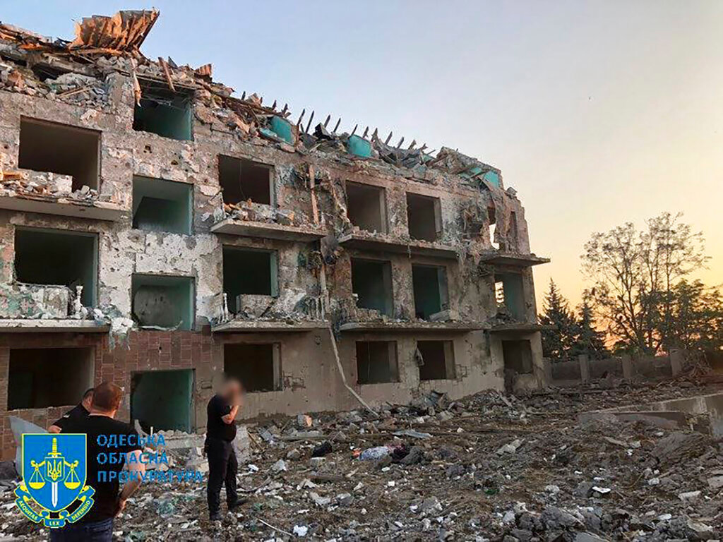 A damaged residential building is seen in Odesa, Ukraine, early Friday, July 1, 2022, following Russian missile attacks. (Ukrainian Emergency Service via AP)