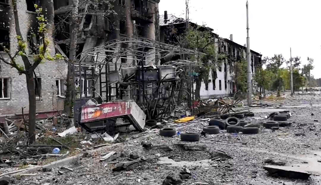 In this photo provided by the Luhansk region military administration, damaged residential buildings are seen in Lysychansk, Luhansk region, Ukraine, early Sunday, July 3, 2022. Russian forces pounded the city of Lysychansk and its surroundings in an all-out attempt to seize the last stronghold of resistance in eastern Ukraine's Luhansk province, the governor said Saturday. A presidential adviser said its fate would be decided within the next two days. (Luhansk region military administration via AP)