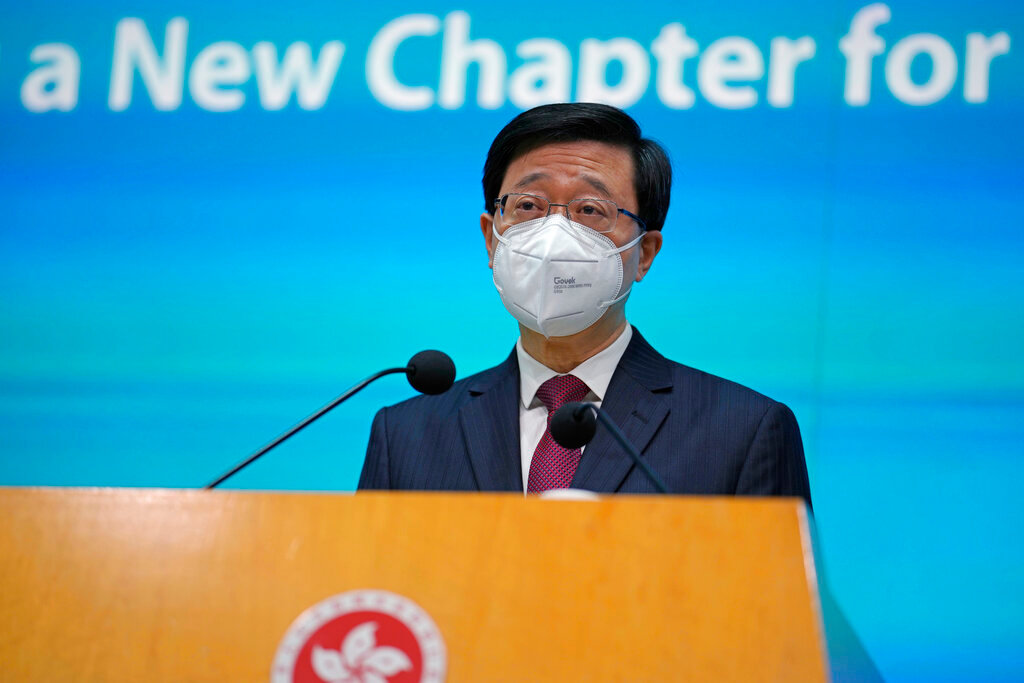 Hong Kong Chief Executive John Lee speaks during a news conference in Hong Kong, Tuesday, July 5, 2022. (AP Photo/Kin Cheung)