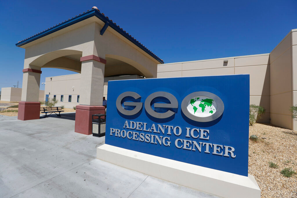 This Aug. 28, 2019, photo shows the Adelanto U.S. Immigration and Enforcement Processing Center in Adelanto, Calif. (AP Photo/Chris Carlson, File)