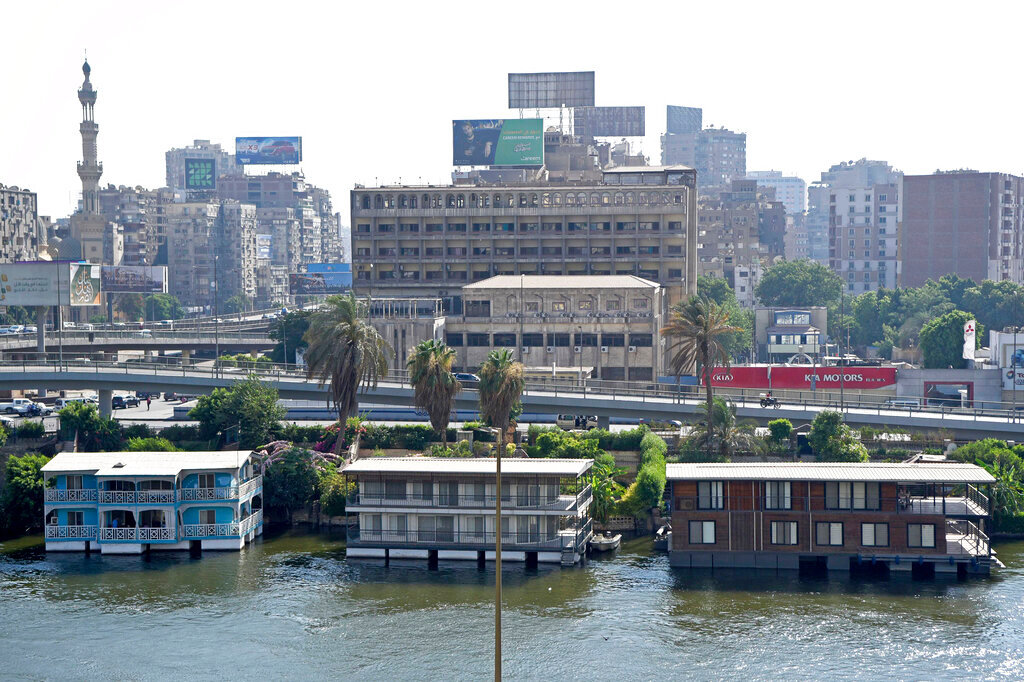 Several houseboats float moored on the banks of the Nile River in Cairo, Egypt on June 27, 2022. (AP Photo/Tarek Wagih)