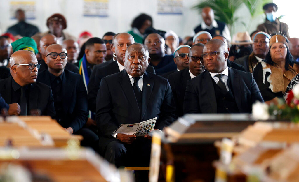South African President Cyril Ramaphosa attends a funeral service in Scenery Park, East London, South Africa, Wednesday, July 6, 2022, for 21 teenagers who died in a mysterious tragedy at a nightclub nearly two weeks ago. (AP Photo)