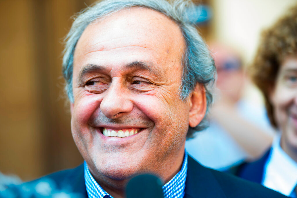 Former president of the European Football Association Michel Platini speaks to the press in front of the Swiss Federal Criminal Court in Bellinzona, Switzerland, Friday, July 8, 2022. (Ti-Press/Alessandro Crinari/Keystone via AP)