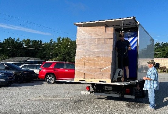 A truckload of meals is delivered to Emanuel Baptist Association, which will distribute them to children in largely rural Emanuel County. (Photo/Emanuel Baptist Association)